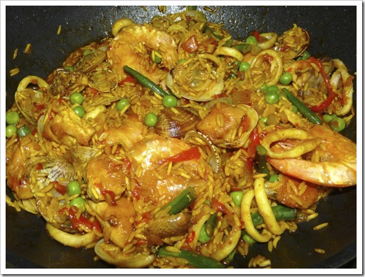 Add the friend seafood and chicken Add the friend seafood and chicken