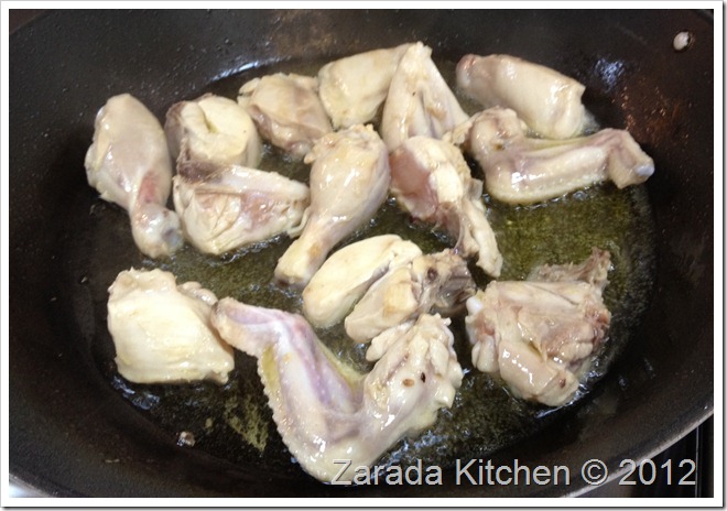 Fry the chicken pieces till brown Fry the chicken pieces till brown
